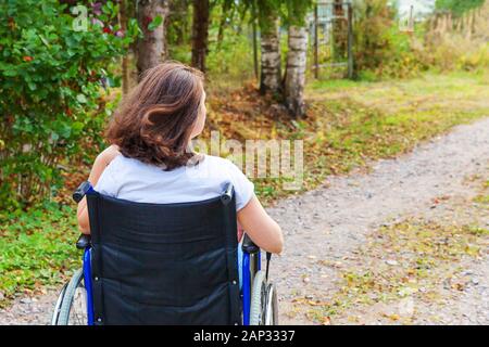 naked girl sitting on a chair in a pensive mood Stock Photo - Alamy
