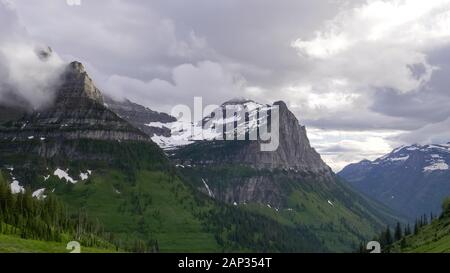 clouds at mt oberlin in glacier national park Stock Photo