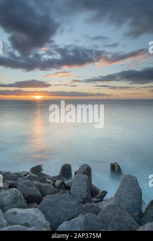Landscape photography of sunset near Anfi del Mar beach in the south of Gran Canaria, Canary Islands, Spain Stock Photo