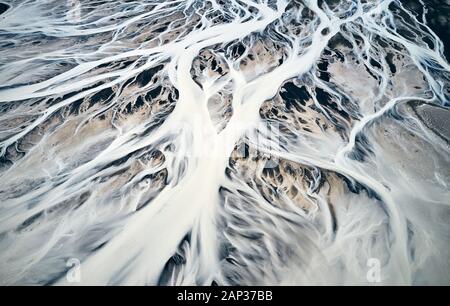From above breathtaking abstract background of ice river delta in winter Stock Photo