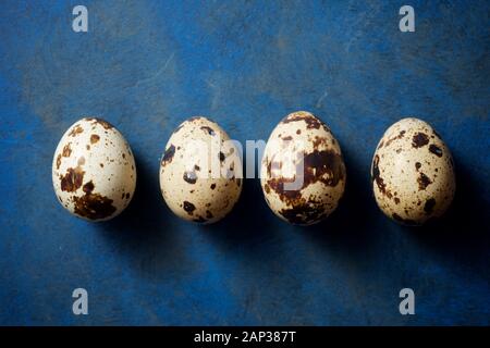 Close-up of some quail eggs. Stock Photo