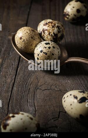 Quail eggs on a wooden table. Stock Photo