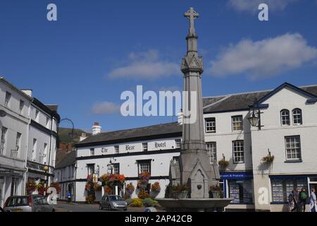 Centre of Crickhowell with the Lucas Memorial Fountain, with the Bear Hotel behind, High Street, Crickhowell, Powys, Wales, United Kingdom Stock Photo