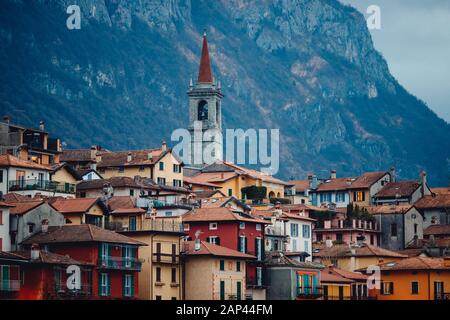 Evening view city Bellagio and Varenna Como water lake Italy blue sky mountain Stock Photo