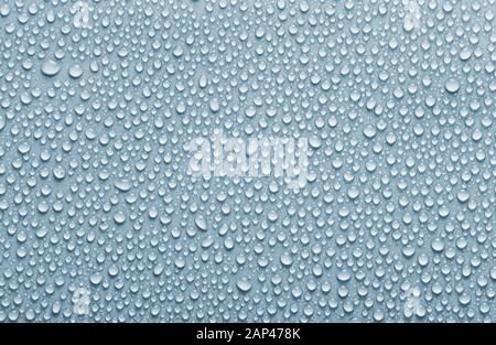 Rain drops background, blue colored water drops texture Stock Photo