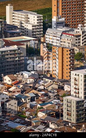 The birds eye view of modern and traditional styles of Japanese residences: the single-family detached house and the multiple-unit building in the cen Stock Photo