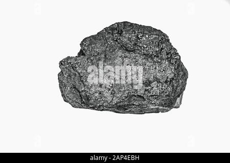 Pieces black coal lie on white isolated background, copy space Stock Photo