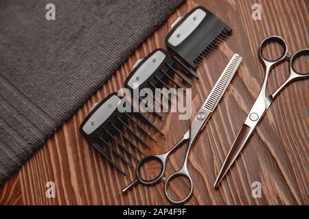 Hairdresser barber shop tools on old wooden background, copy space Stock Photo