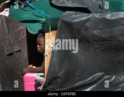 Refugees from all over Africa, seek sanctuary in church square in centre of Cape Town.They feel endangered by the local hostile attitude to themselves. Stock Photo