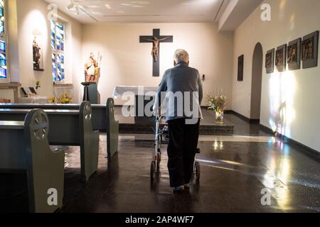 Duesseldorf, Germany. 21st Jan, 2020. A home resident is standing with her walker in the chapel of a nursing home. Free nursing care places should be accessible via the Heimfinder NRW App or the corresponding Internet site on a daily basis. Credit: Federico Gambarini/dpa/Alamy Live News Stock Photo