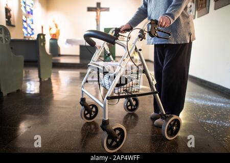 Duesseldorf, Germany. 21st Jan, 2020. A home resident with her walker is standing in the chapel of a nursing home. Free nursing care places should be accessible via the Heimfinder NRW App or the corresponding Internet site on a daily basis. Credit: Federico Gambarini/dpa/Alamy Live News Stock Photo