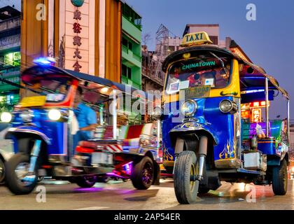 Tuk Tuk in  Yaowarat Road in Bangkok's Chinatown, Bangkok Thailand Stock Photo