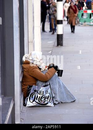 homeless person begging outside sainsbury supermarket camden town Stock ...