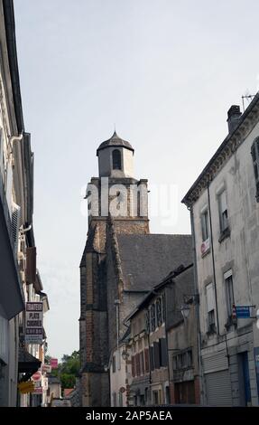 Old street and St Vincent's church in Nay. A bastide town built in 1302 by the viscountess of Béarn, Marguerite de Moncade. France Stock Photo