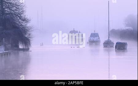 Wareham, Dorset, UK. 20th Jan, 2020. UK Weather: The boats moored along the River Frome emerge fom the chilly mist on a bitingly cold winter's morning. Credit: Celia McMahon/Alamy Live News Stock Photo