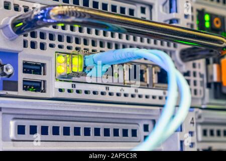 Trunk Internet cable close-up. High-speed data transfer concept. Optical fiber telecommunication cable is connected to the interface Stock Photo