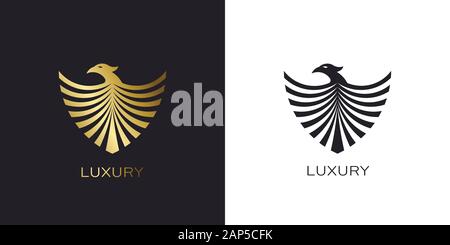 Phoenix Gold shield logo stylized golden flying bird Stock Vector