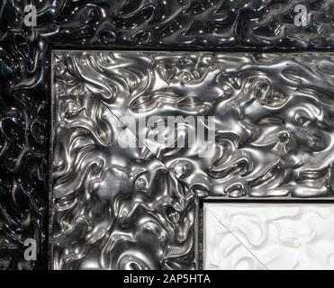detail of ornamental picture frame, silver color. Stock Photo