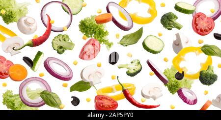 Flying vegetables mix background isolated on white Stock Photo