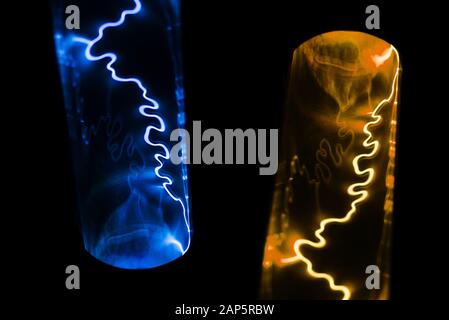 Phantom blue lightning and lush color lava on a black background. Magic light effect from electric discharge Stock Photo