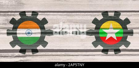 Web Banner, Header Layout Template. Politic and economic relationship between India and Myanmar. National flags on cog wheels. Wood texture Stock Photo