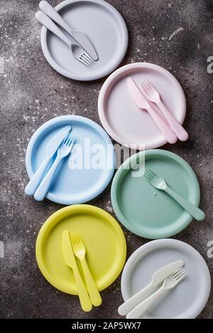 Colorful plastic dishes for summer picnic Stock Photo