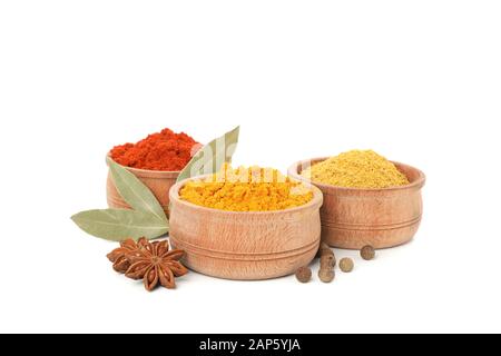 Wooden bowls with powders and ingredients isolated on white background Stock Photo