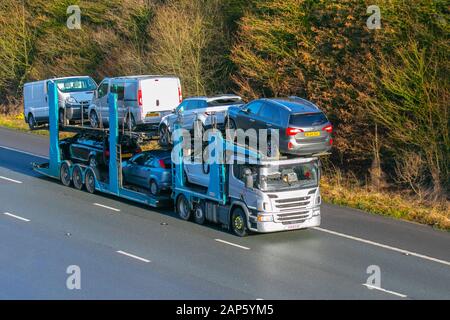 Bulk Haulage delivery trucks, haulage, lorry, transportation,  collection and deliveries, truck, cargo, Scania vehicle, delivery, transport, industry, supply chain freight, on the M6 at Lancaster, UK Stock Photo