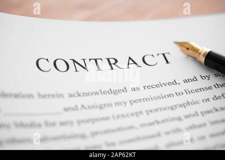 Business contract and pen on the desk. Business and finance concept. Stock Photo