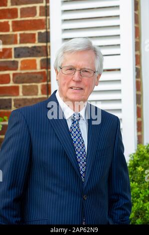 Marlow, UK. 13th May, 2014. BBC Countryfile Television presenter and journalist John Craven OBE signs his BBC Countryfile Handbook at the Macdonald Compleat Angler Hotel. Credit: Maureen McLean/Alamy Stock Photo