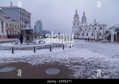 Minsk, Belarus - November 26, 2019: NemigaTrinity Suburb. The cathedral of Holy Spirit in the snow. Stock Photo