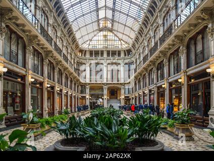 View of the historic Galleria Subalpina shopping gallery in the city centre of Turin, with shops, cinema and cafè, Piedmont, Italy Stock Photo
