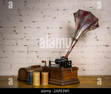 Edison Fireside Phonograph with three cylinder records Stock Photo