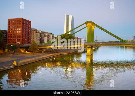 Skyline of Frankfurt with Main river, Green Bridge and European Central Bank in the background. Frankfurt, Germany Stock Photo