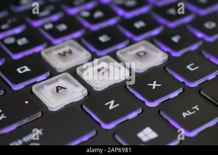 A computer keyboard is a typewriter-style device which uses an arrangement of buttons or keys to act as mechanical levers or electronic switches. Stock Photo
