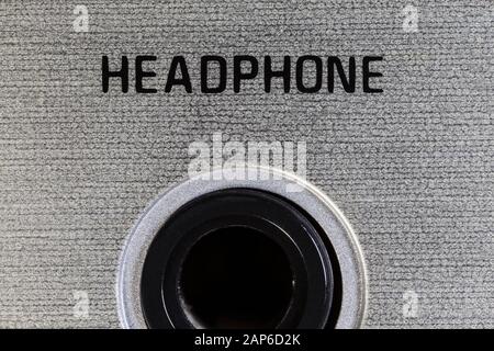Close up macro photograph of headphone jack on vintage boombox stereo. Stock Photo