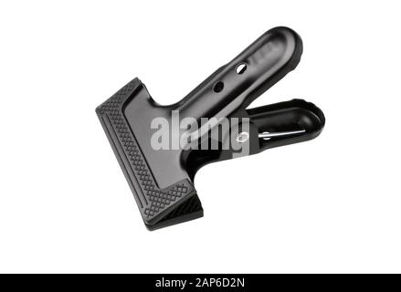 Black clip isolated on white background.  Metal binder clip. Black Clamp. Stock Photo
