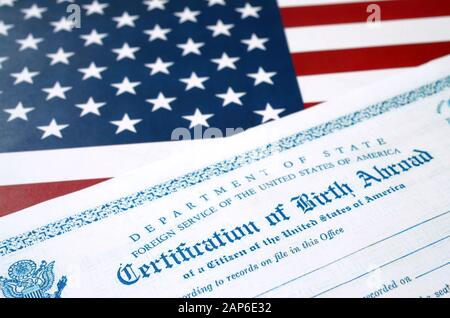 Fs-545 Certification of birth abroad lies on United States flag with ...