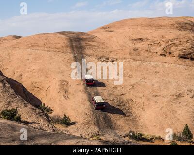 A 4x4 Hummer tour on the Hell's Revenge Trail in the Sandflats Recreation Area near Moab, Utah. Stock Photo