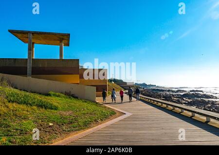 Porto Homem do Leme Beach Picturesque View with Walking People on a Sunny Blue Sky Day Stock Photo