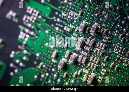 Circuit board. Electronic computer hardware technology. Motherboard digital chip. Tech science background. Integrated communication processor. SMD Stock Photo