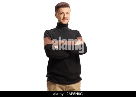 Young smiling guy wearing a turtleneck sweather posing with arms crossed isolated on white background Stock Photo