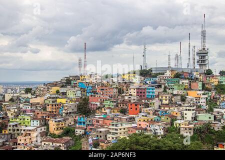 Colorful houses on a hill in a slum in Guayaquil, Ecuador Stock Photo