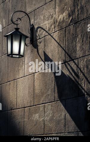 Vintage Lantern with Shadows on the wall Stock Photo