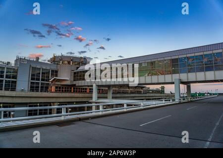 Exterior view of historic John F. Kennedy Airport and the surrounding area in New York at sunset Stock Photo