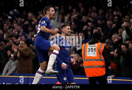 Chelsea's Jorginho celebrates scoring his side's first goal of the game from the penalty spot with Cesar Azpilicueta (left) during the Premier League match at Stamford Bridge, London. Stock Photo