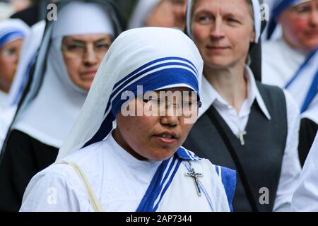 Nun from Missionaries of Charity - a Catholic religious congregation established in 1950 by Mother Teresa - at religious parade in Vilnius, Lithuania Stock Photo