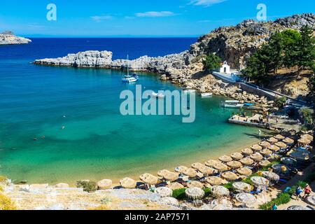 Overlooking the stunning St Pauls Bay Lindos Rhodes Island Greece Europe Stock Photo