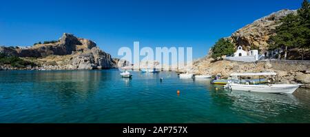 Stunning sunny day at St Pauls Bay Lindos Rhodes Island Greece Europe Stock Photo