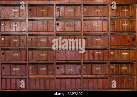 old apartment complex housing mailboxes Stock Photo